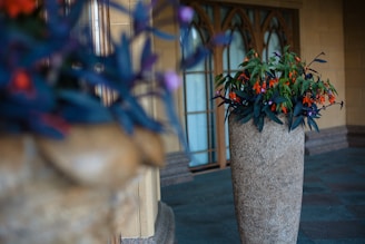 Elegant floor vase filled with vibrant flowers.