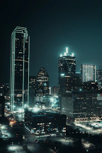 A futuristic city skyline glowing with green neon lines symbolizing advanced telecommunications.