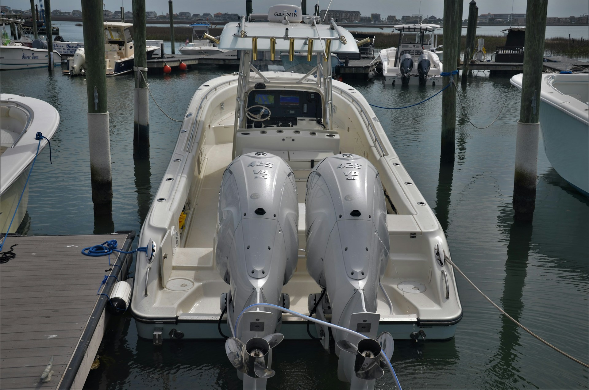 white yacht on body of water during daytime