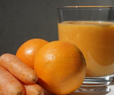 orange fruit on clear glass bowl