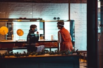 Customer interacting with staff inside Criptofua's cozy exchange office.