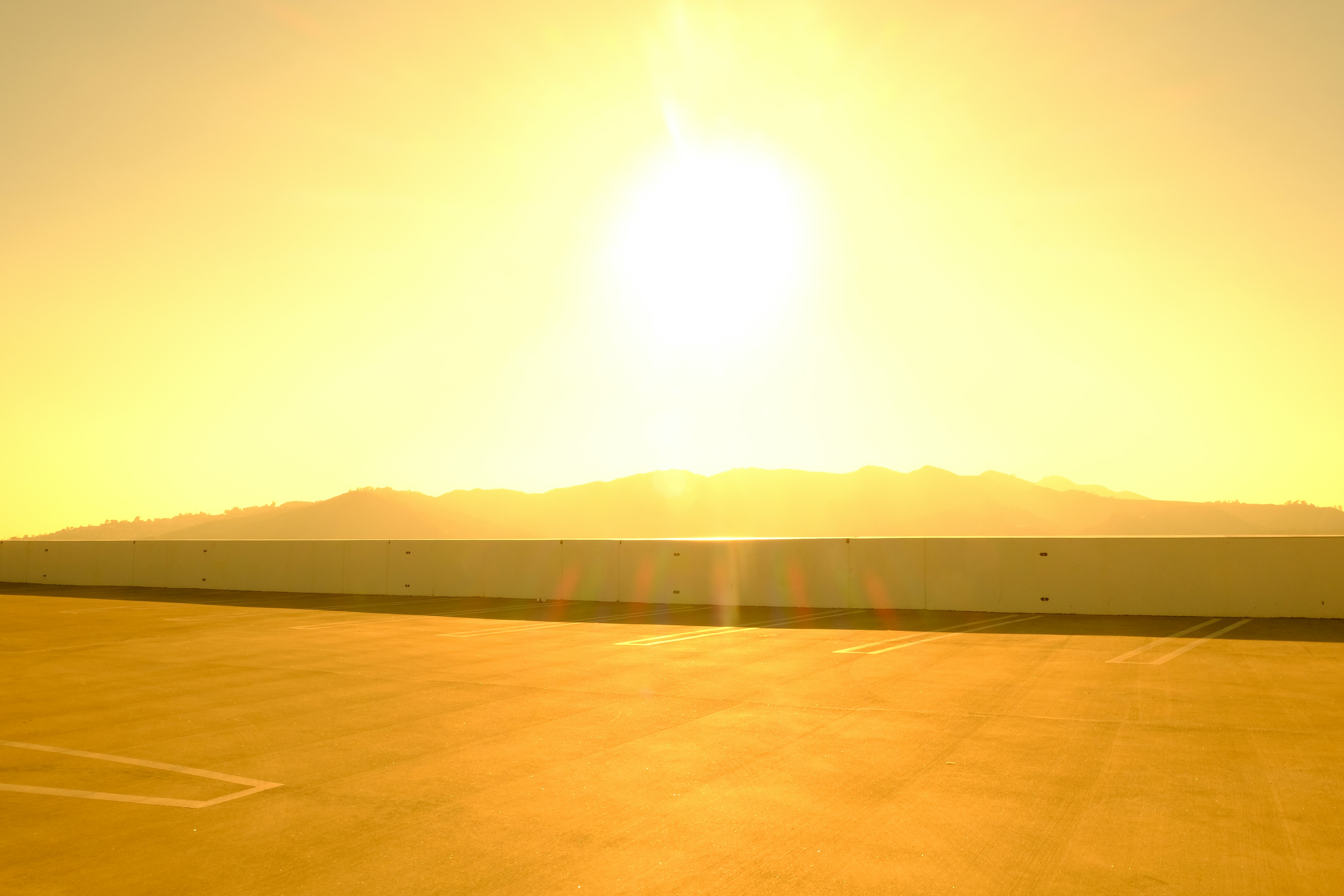 sun setting over the mountains
