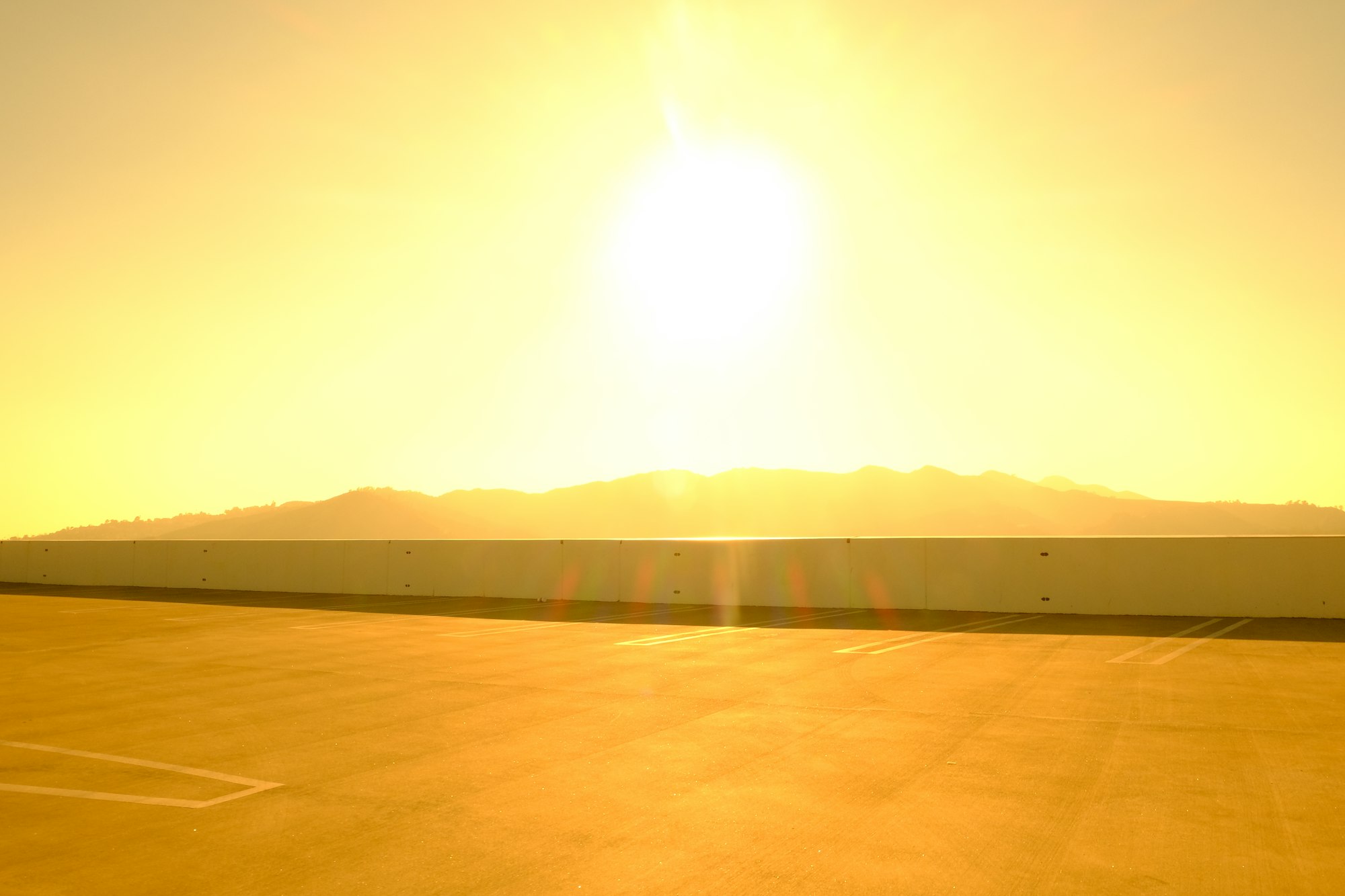 sun setting over the mountains