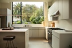 A beautifully designed modular kitchen with modern appliances.