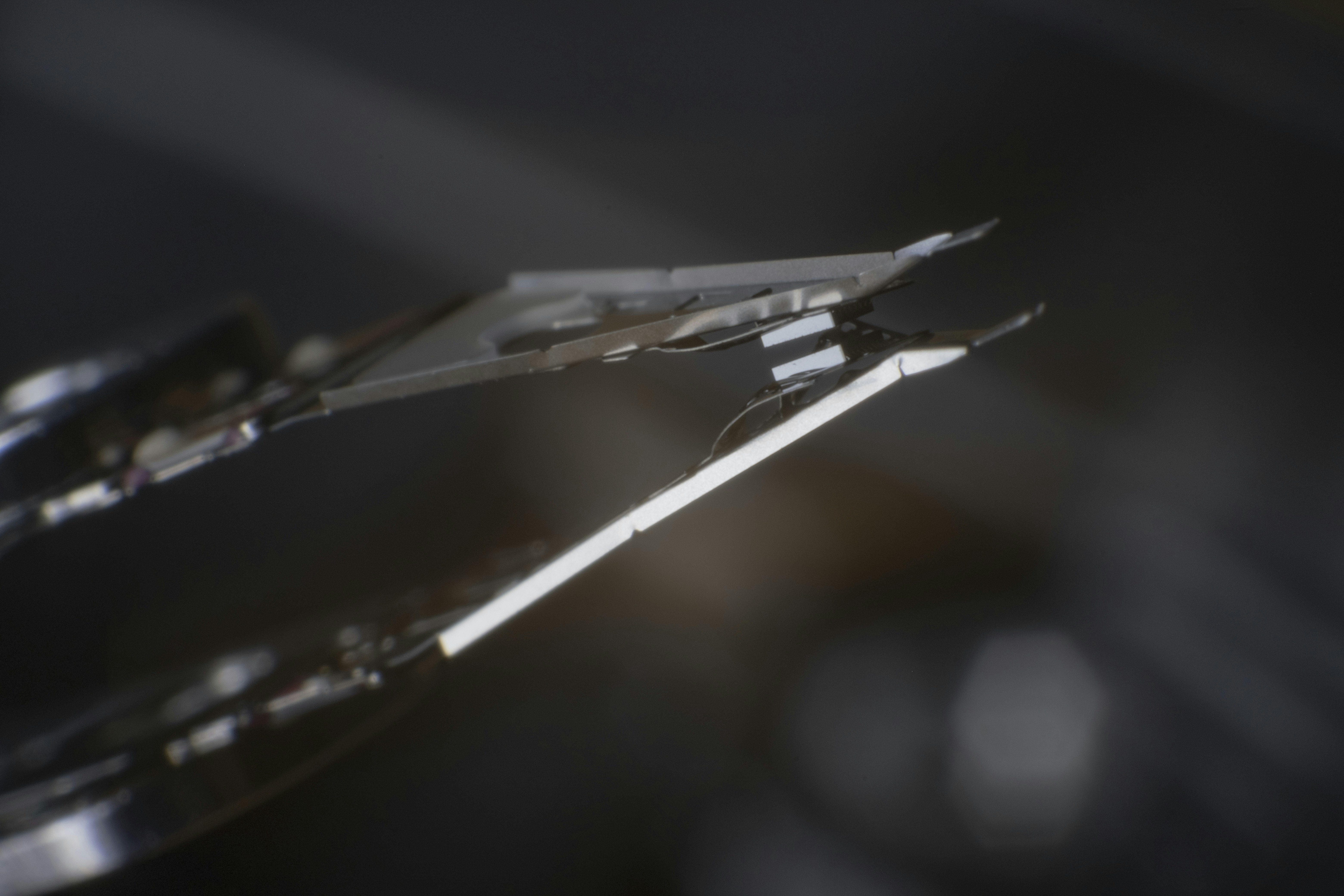 smartphone hinge mechanism mechanical engineering close up