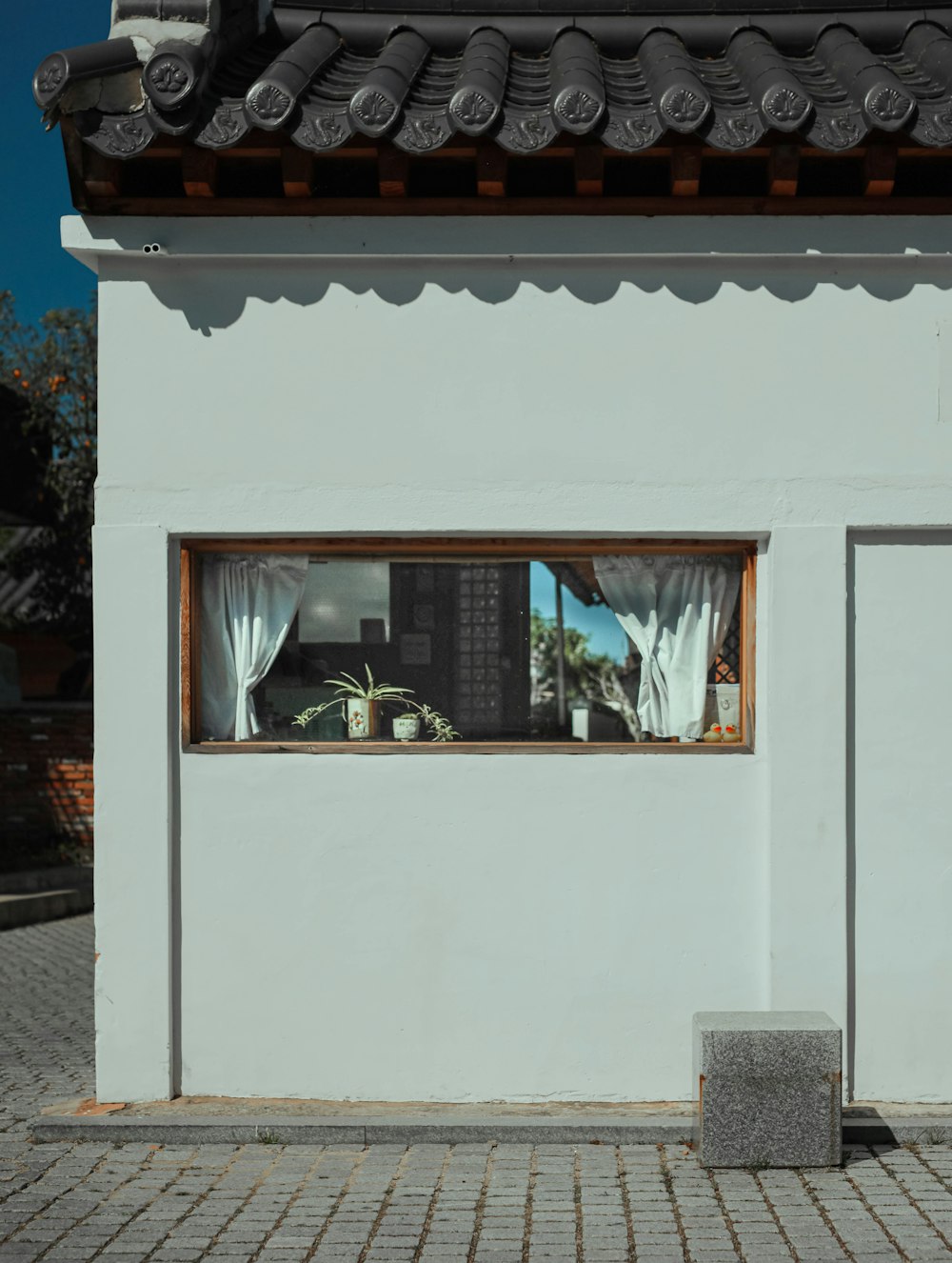 white and brown wooden house