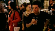 A vibrant social gathering with drinks and games.