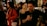 A diverse group of people engaging in a lively conversation in a modern lounge setting.