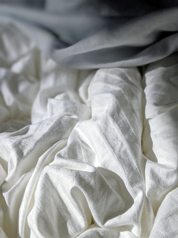 White and green floral printed textile for decorative duvet covers