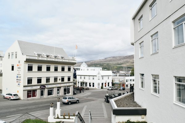White houses on a street in the centre — Akureyri, Iceland