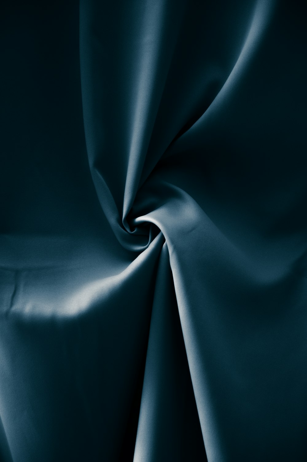 blue textile in close up photography