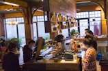 A cozy café with people enjoying their drinks.