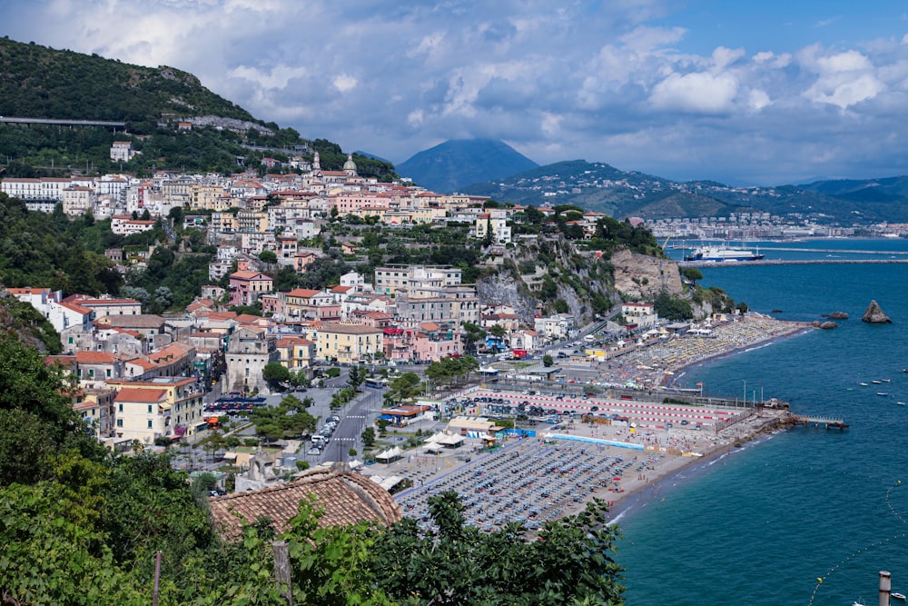 aerial view of city near body of water during daytime