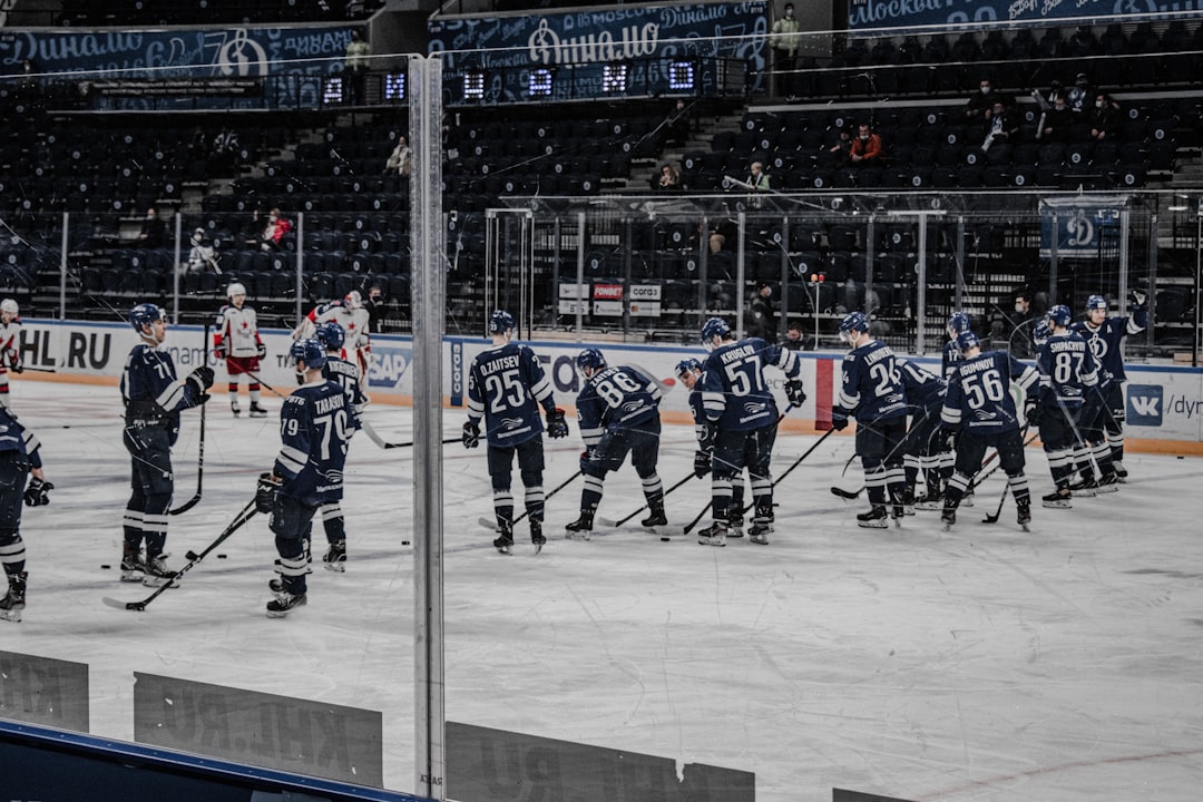 ice hockey players on ice hockey field