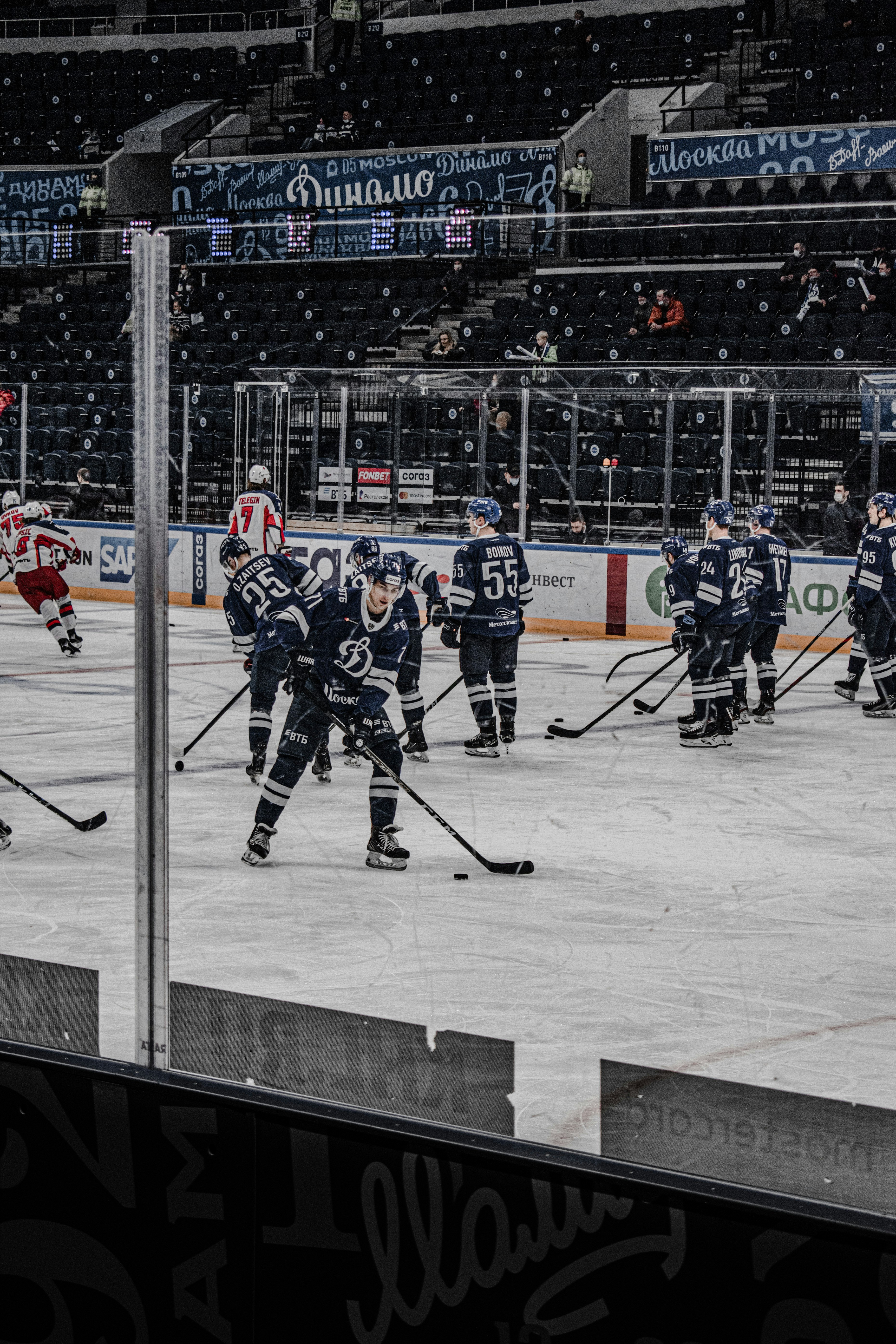 ice hockey players on ice hockey field