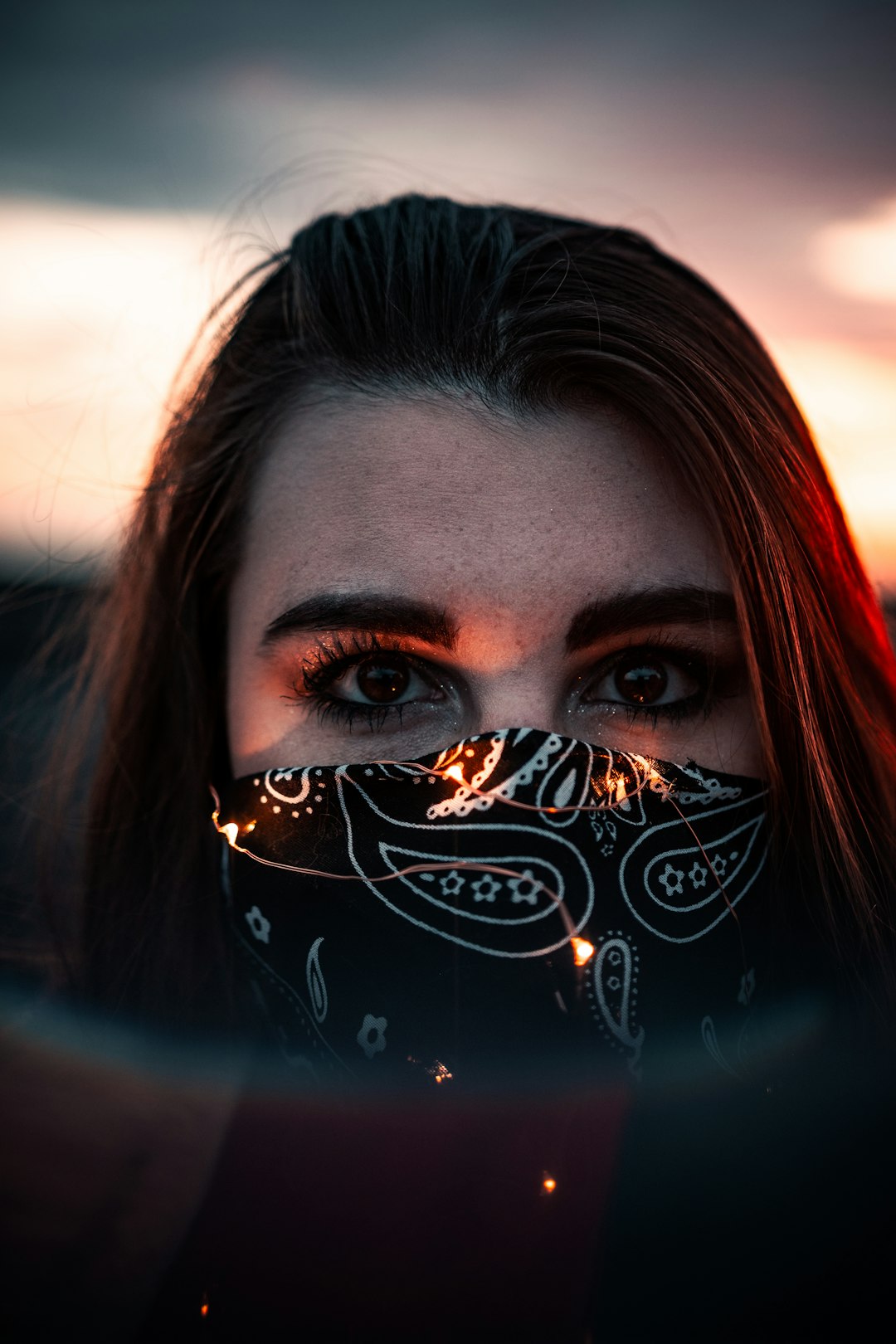 woman with black and white butterfly on her face