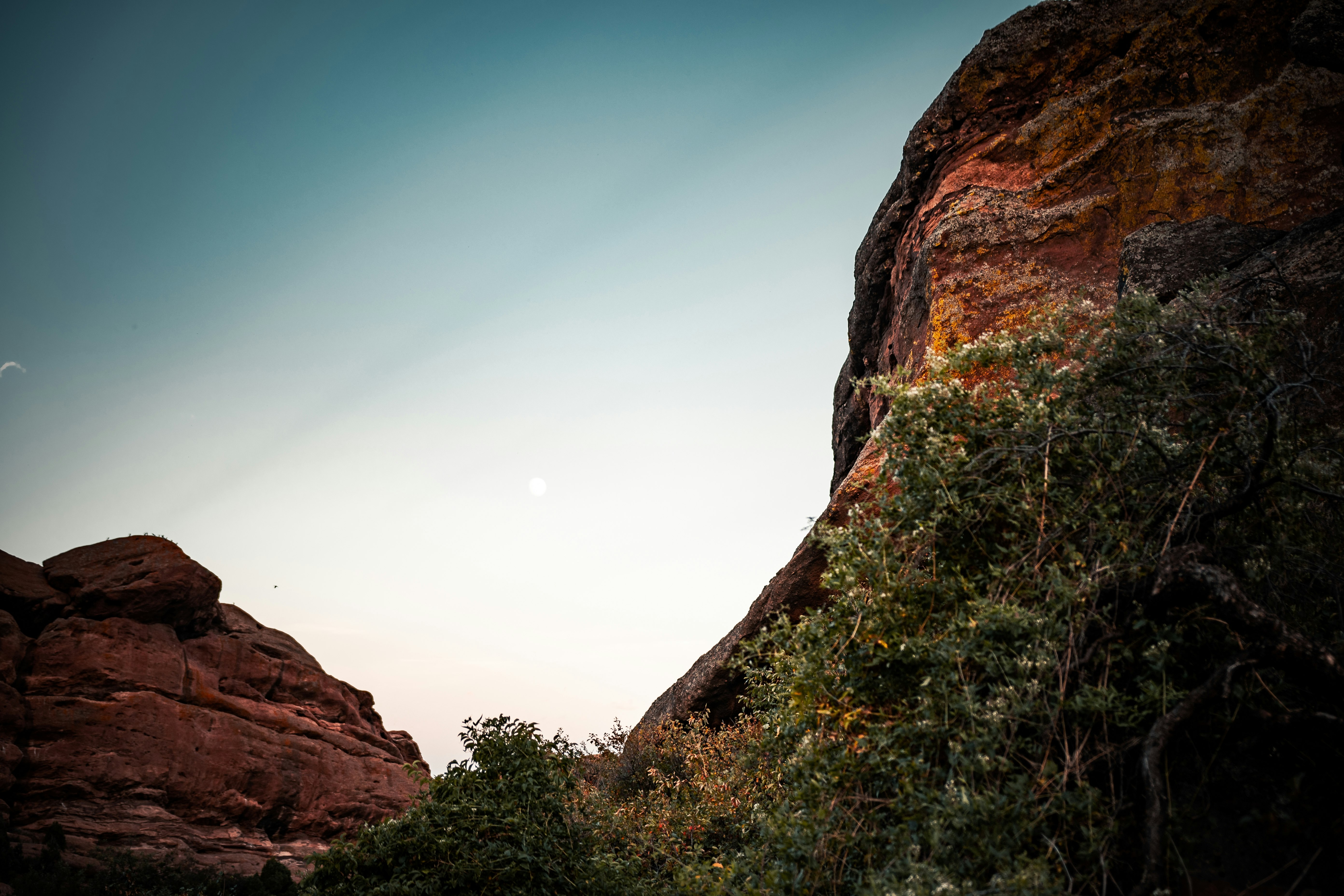 brown rocky mountain under blue sky during daytime