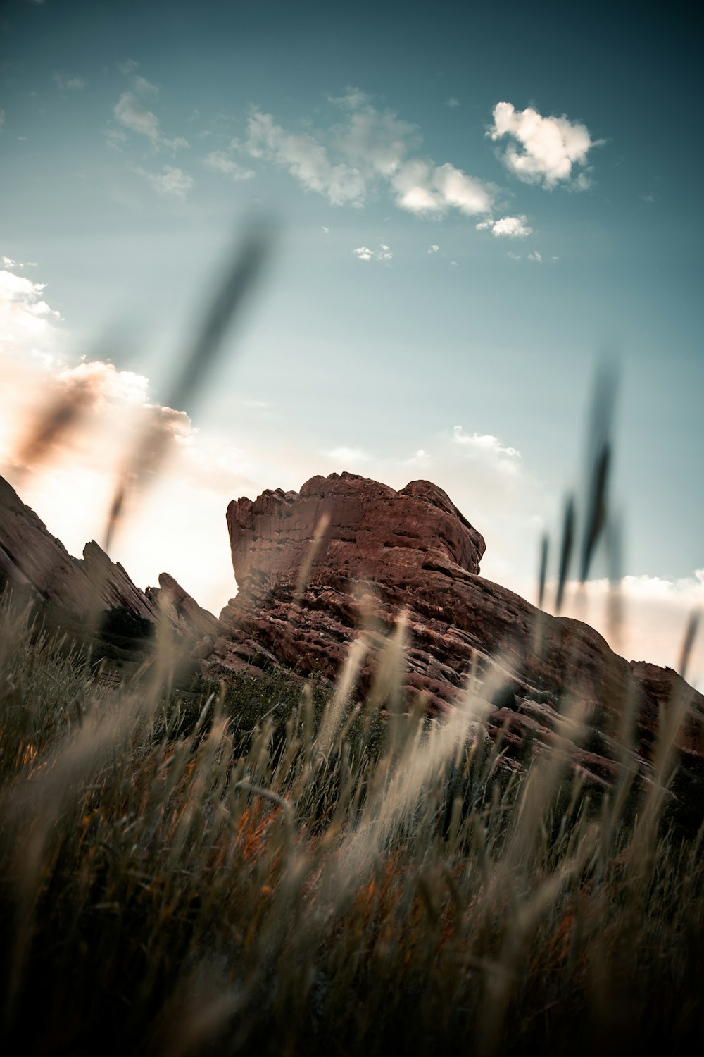 brown rock formation under blue sky during daytime