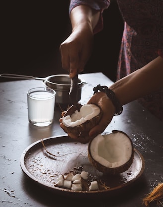 person holding white ceramic mug with coffee