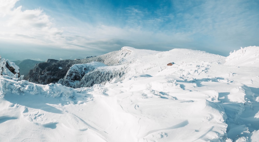 snow covered mountain under blue sky during daytime