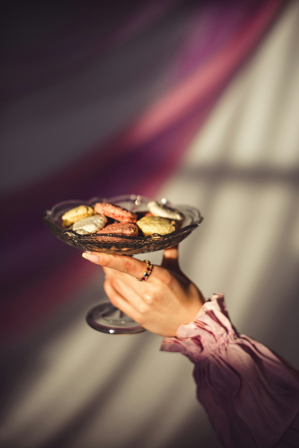 person holding black ceramic bowl