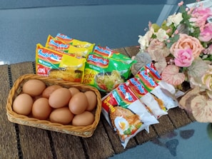 A neat arrangement of Nestia Life’s rice powder and batter packets on a wooden table.