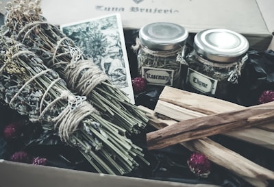 brown wooden sticks on clear glass jar ritual google meet background