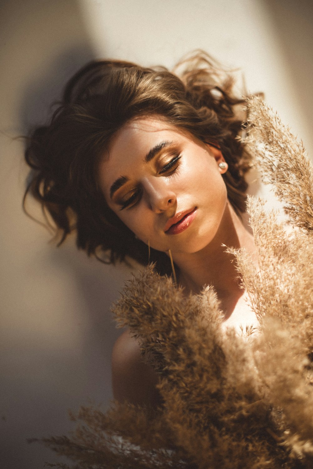 woman in brown fur coat