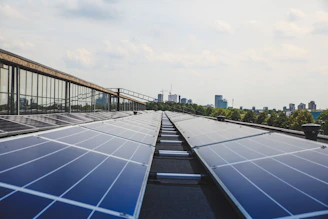 A bright Karachi rooftop with sleek solar panels soaking up the sun.