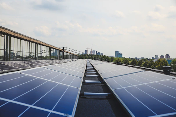 A bright Karachi rooftop with sleek solar panels soaking up the sun.