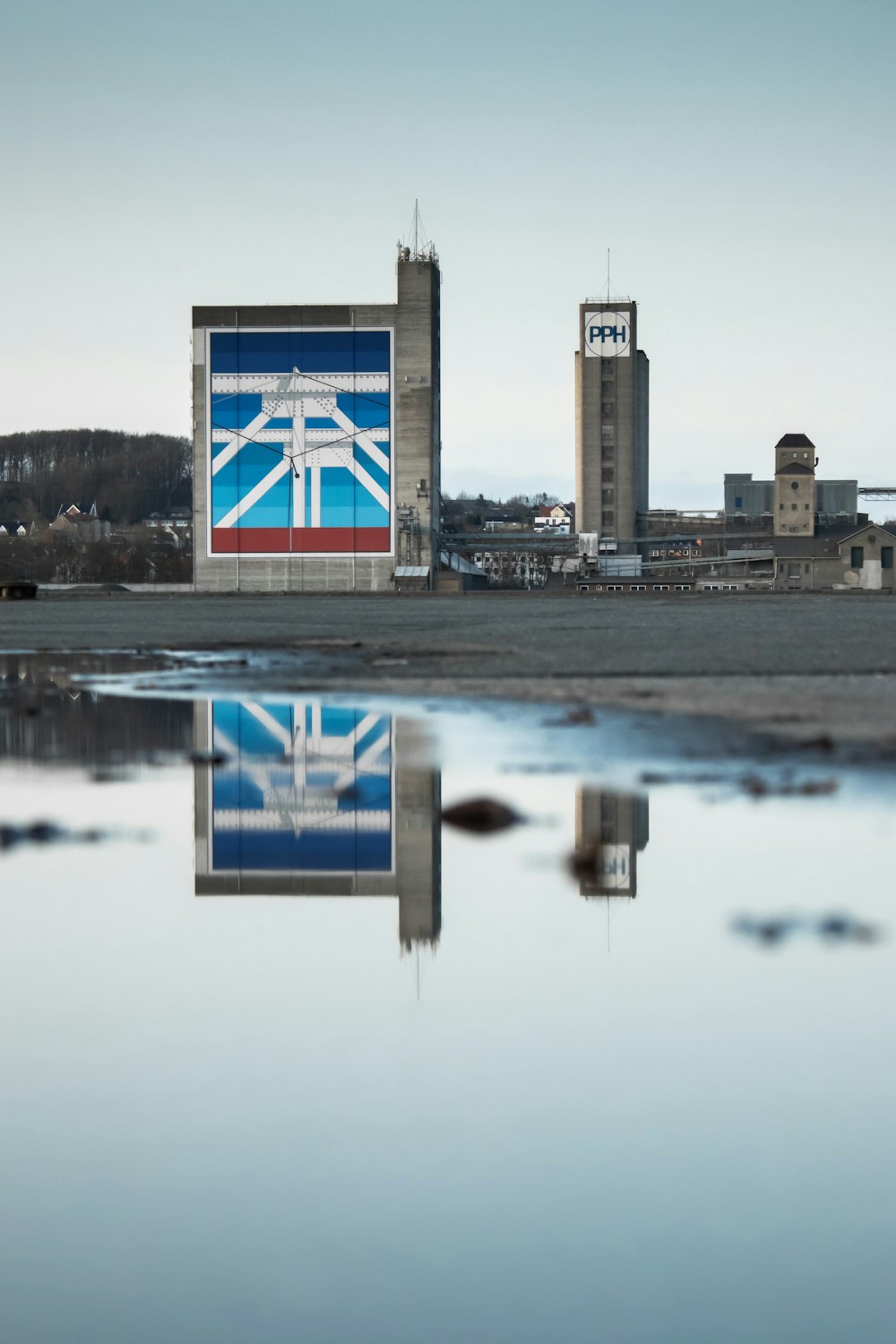 body of water near city buildings during daytime