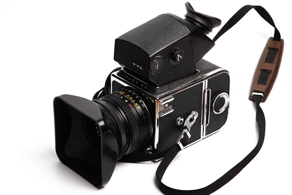 black and silver dslr camera