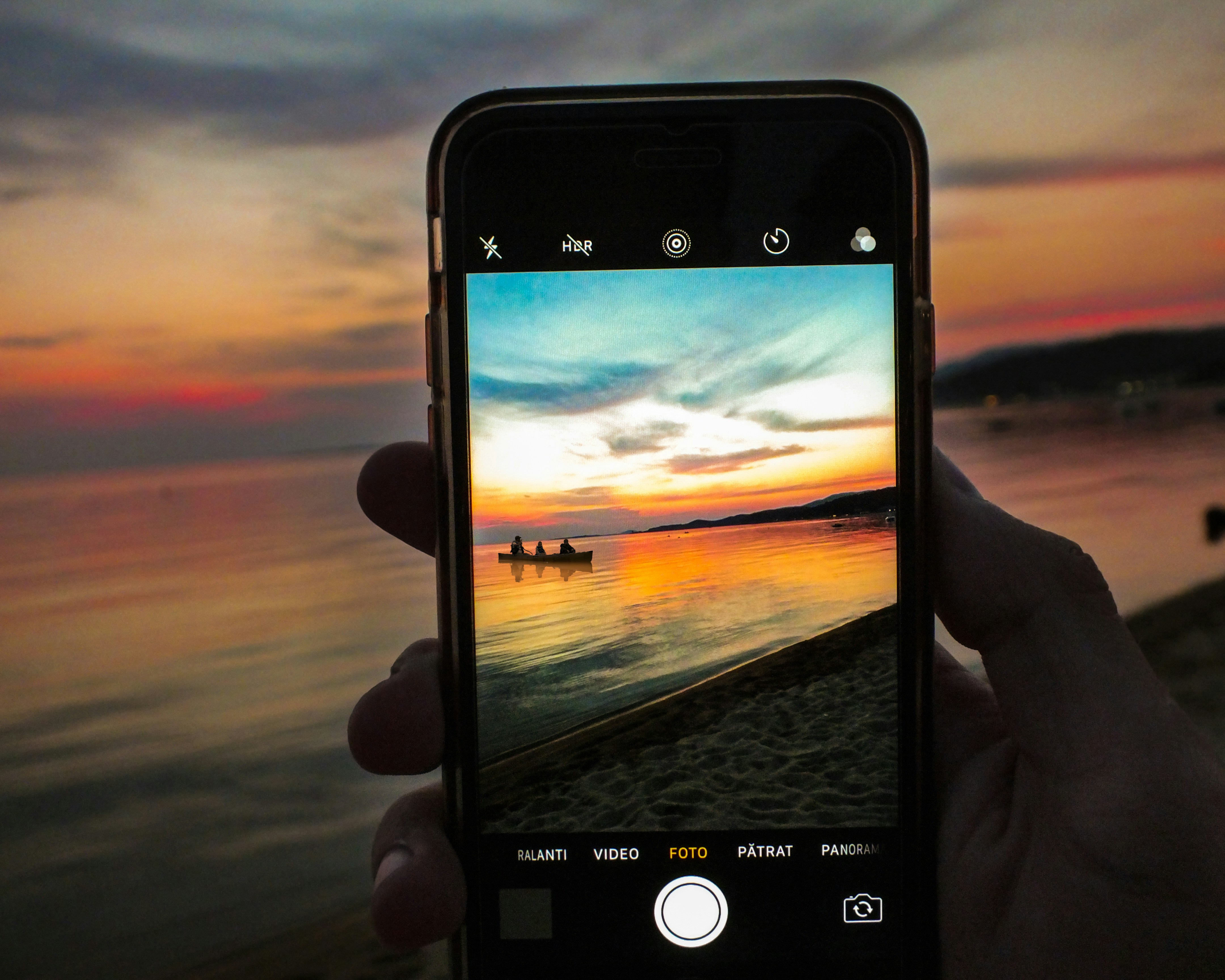 person holding black iphone 5