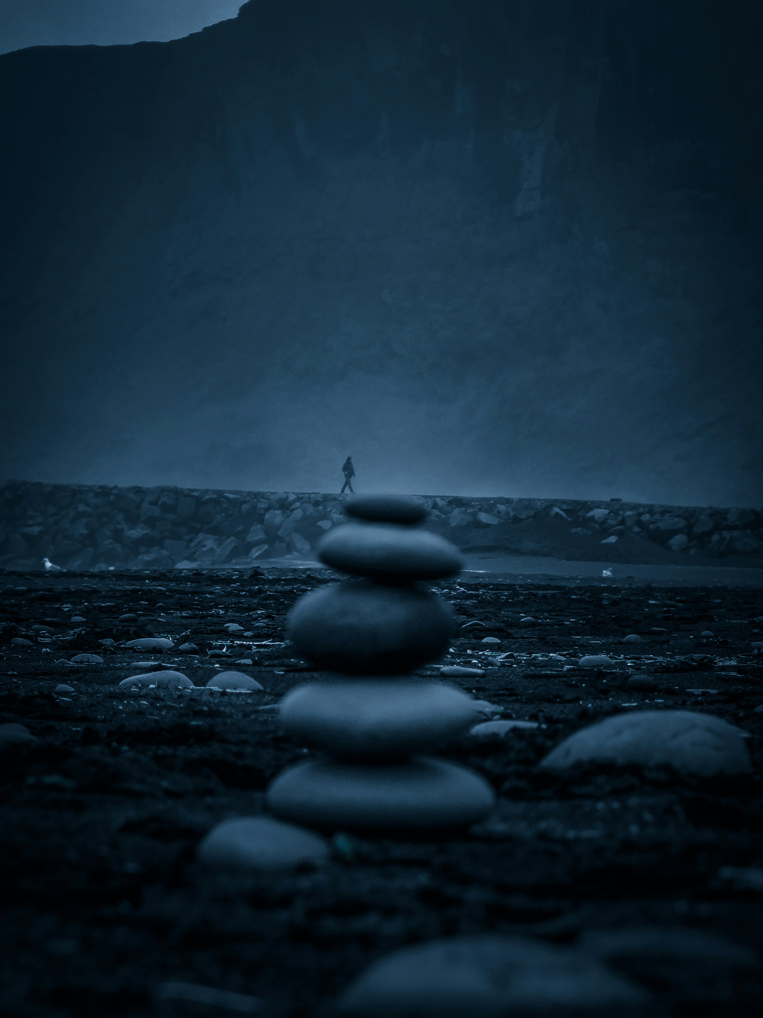 gray stone on gray sand