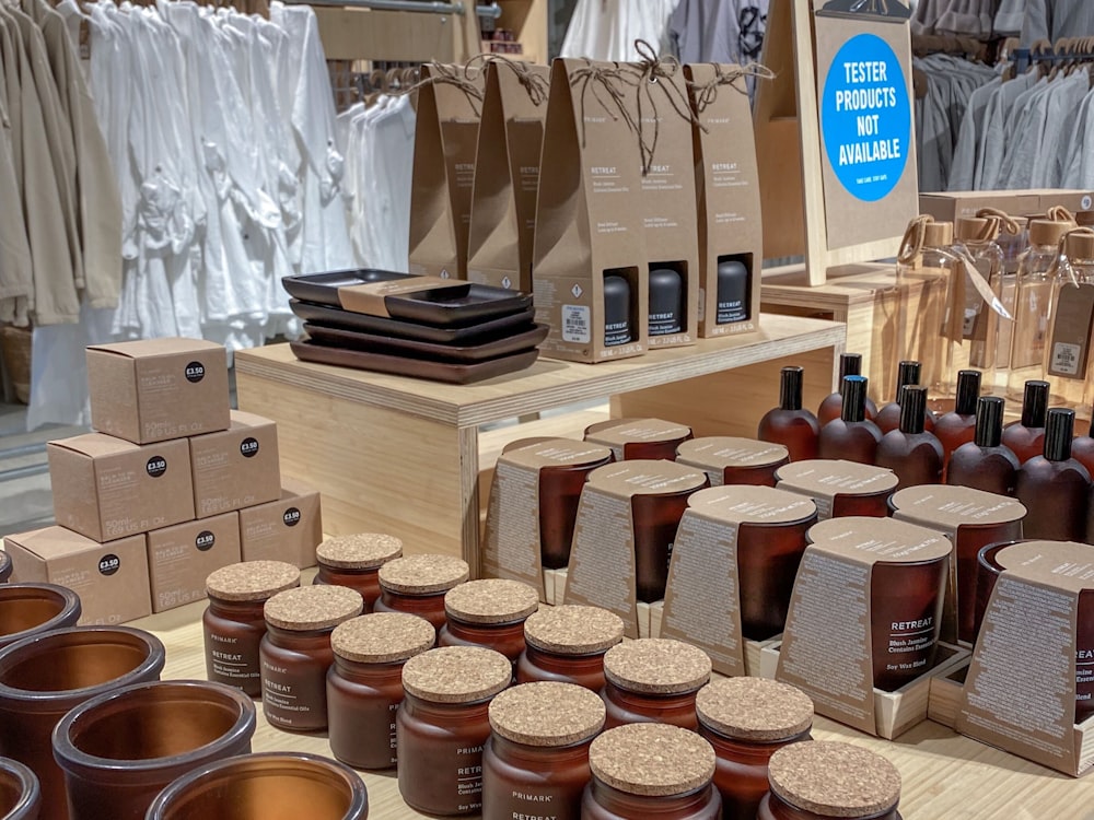 brown wooden box with brown and black ceramic mugs