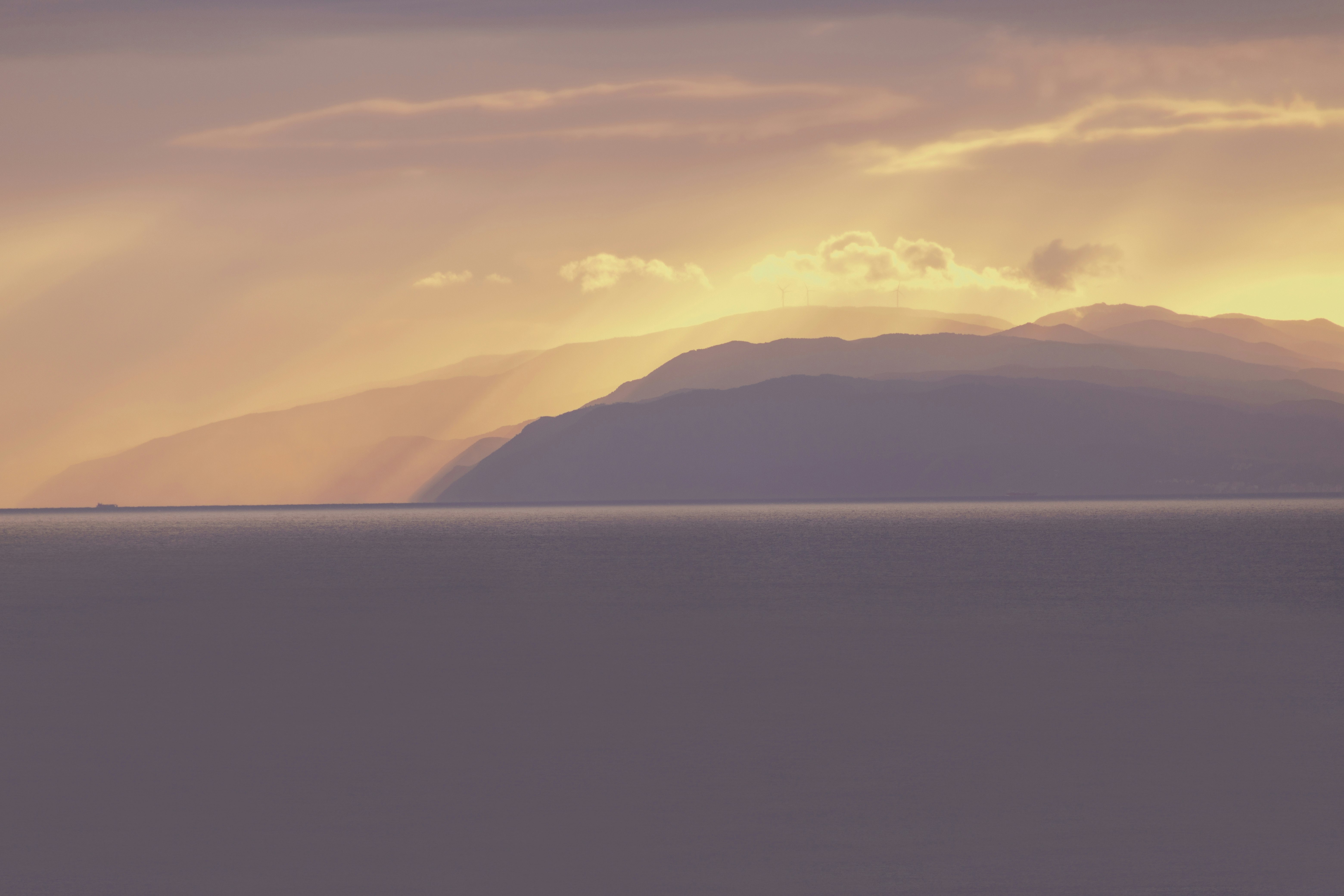 silhouette of mountains during sunset