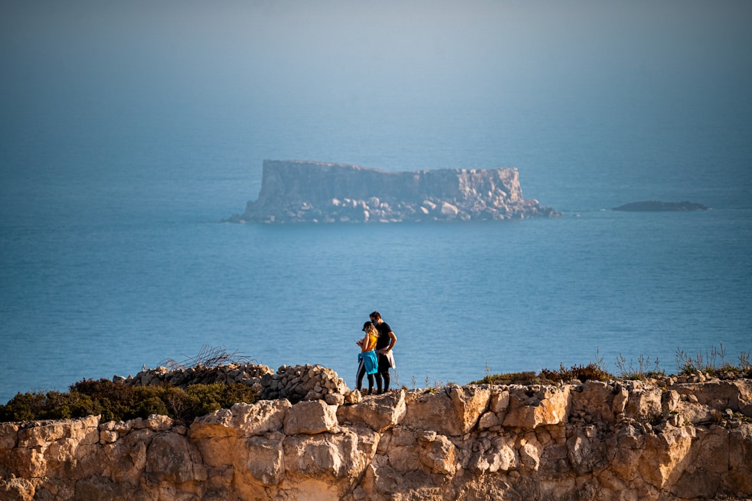 Coastal and oceanic landforms photo spot Siggiewi Għajn Tuffieħa