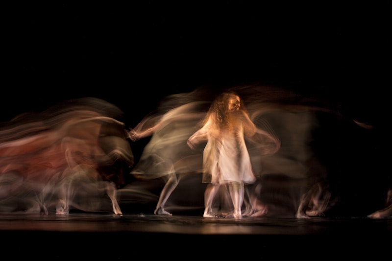 Abstract motion blur of a dancer in flowing fabric