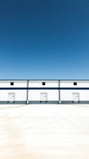 white concrete building under blue sky during daytime