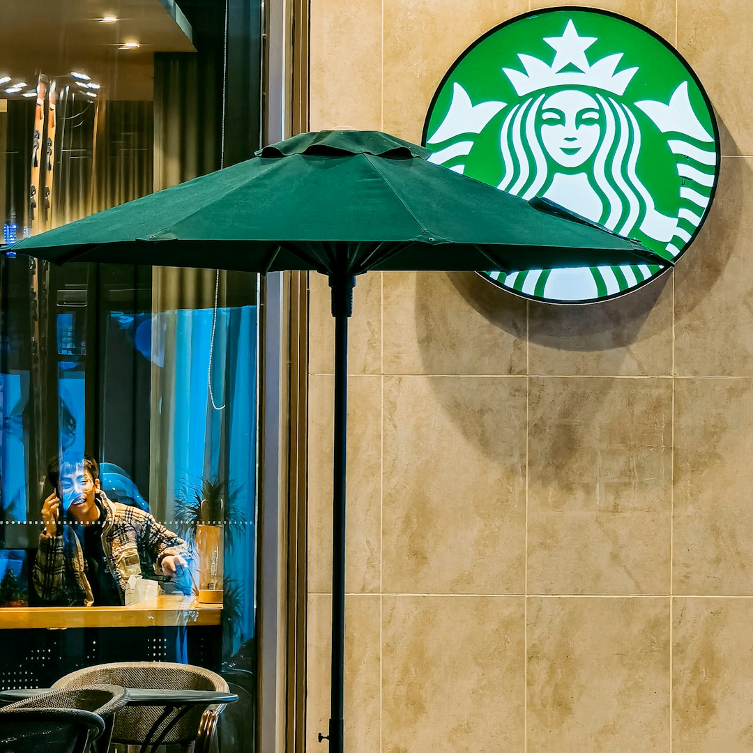 green and white patio umbrella