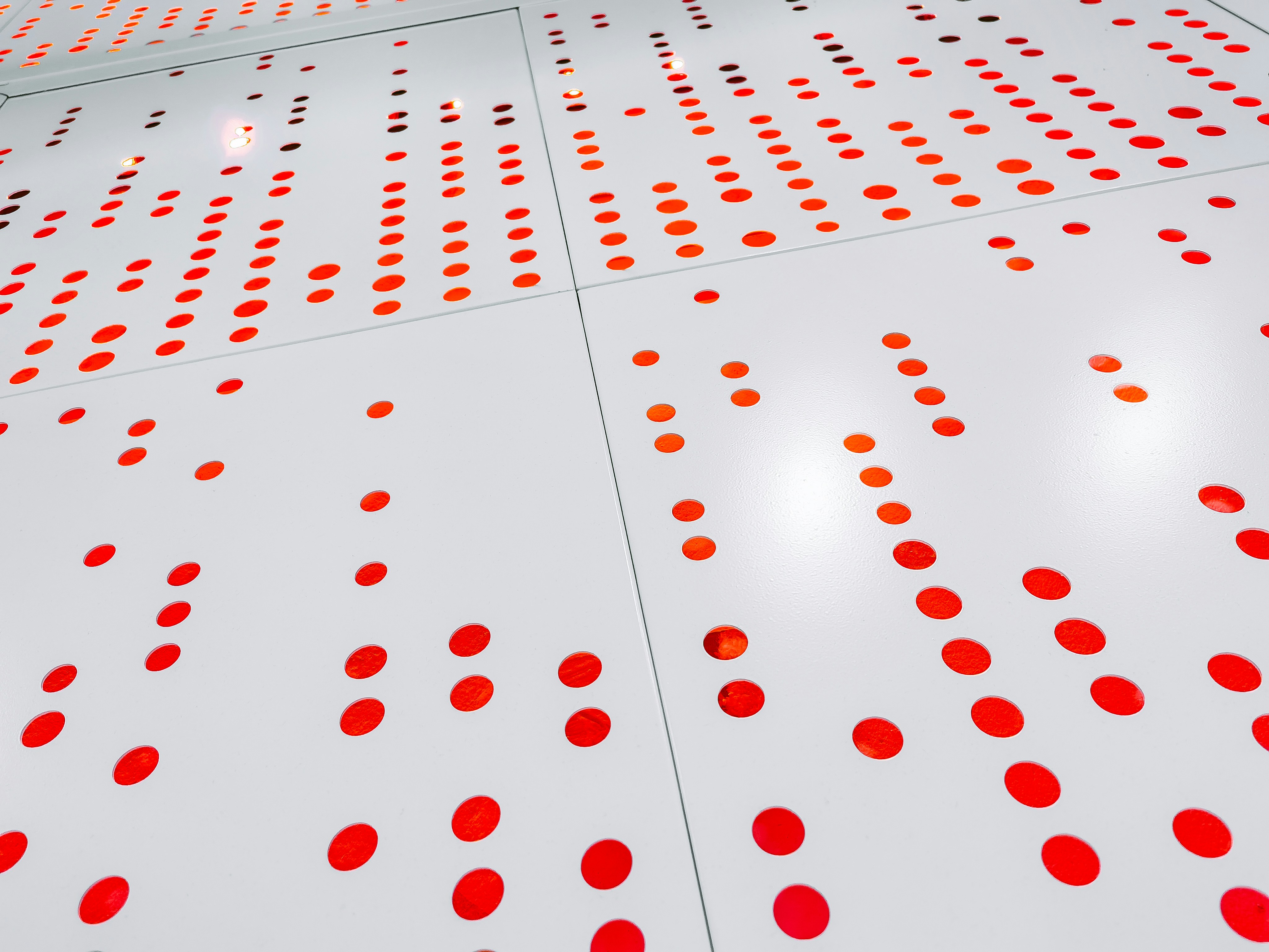 white and red polka dot textile