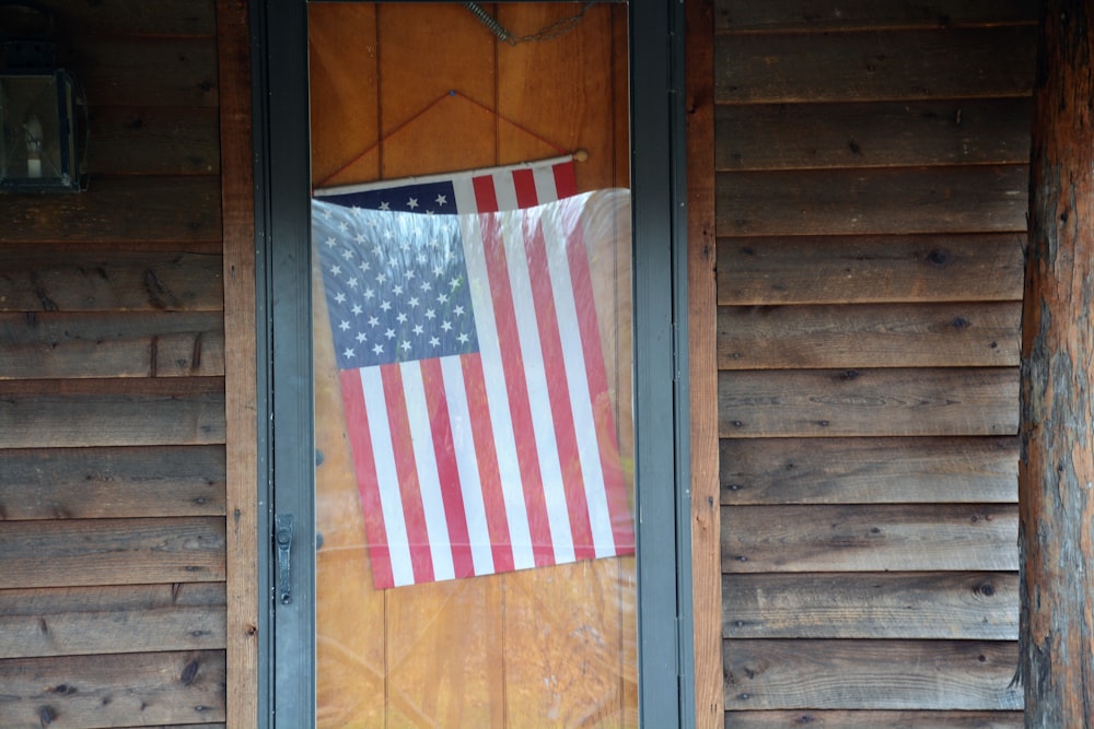 us a flag on brown wooden door