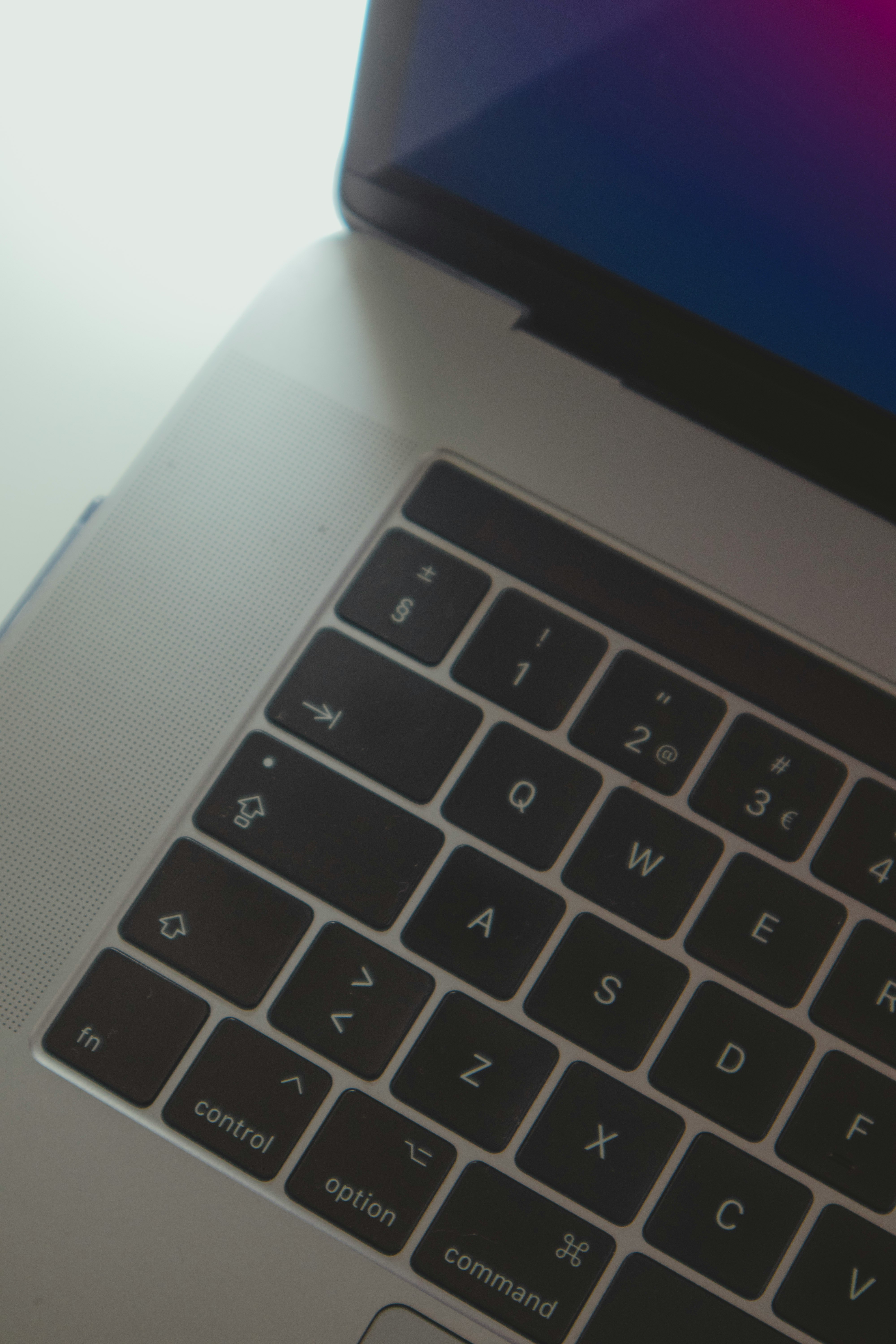 black and silver laptop computer