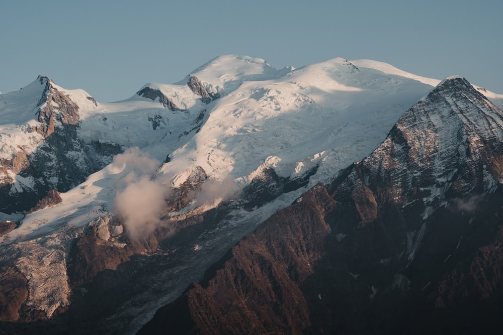 brown and white mountain under blue sky during daytime