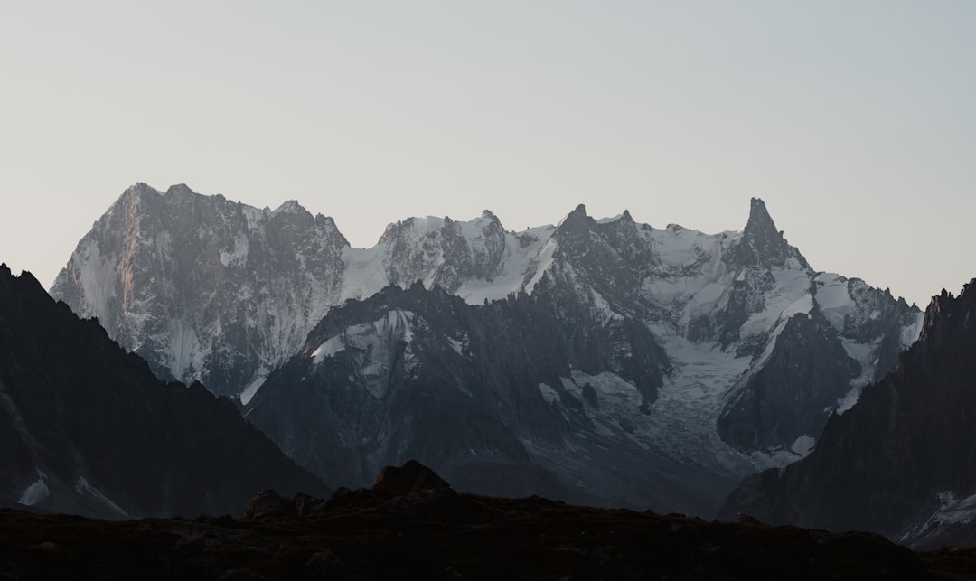 snow covered mountain during daytime