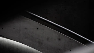 A concrete staircase under construction, showing the formwork and reinforcement bars.