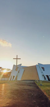 Sunset view of Revival Church Lawrenceville's modern building with warm lights glowing.