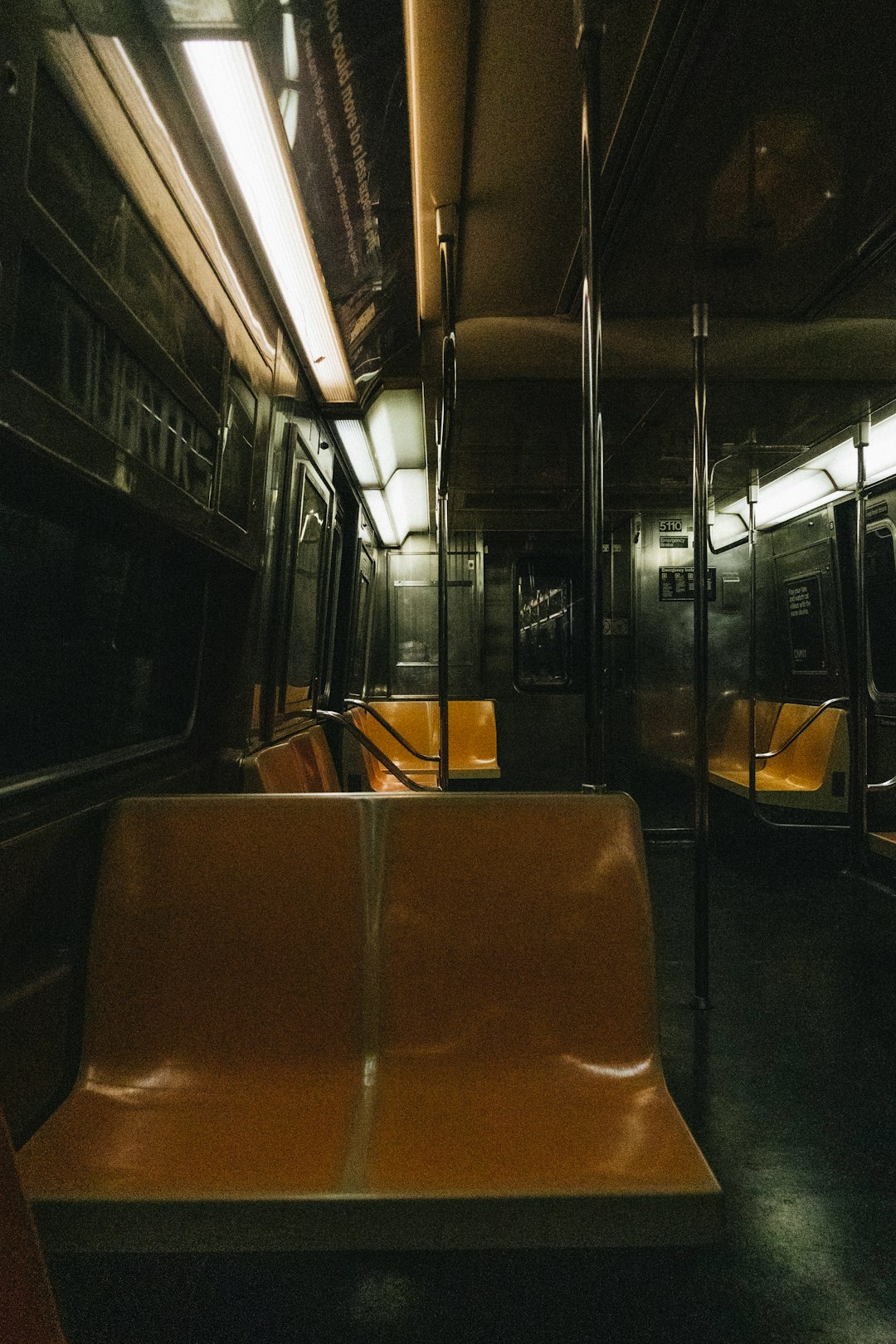 brown leather bus seat during night time