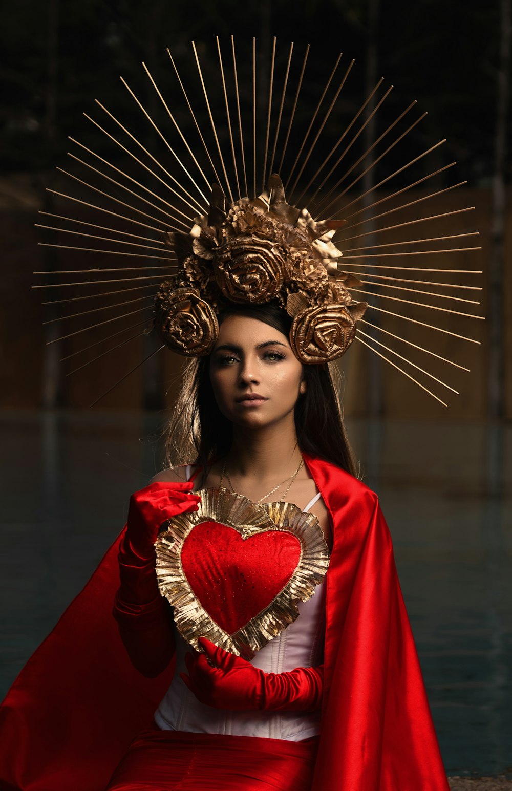 woman in red dress with gold floral headdress