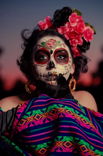 woman in red and blue floral dress with white mask